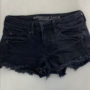 black cutoff shorts